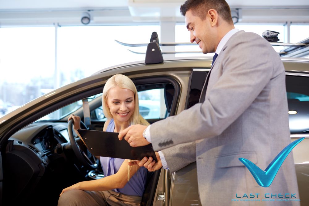 Last Check inspector explaining a vehicle inspection report to a customer in Sydney NSW