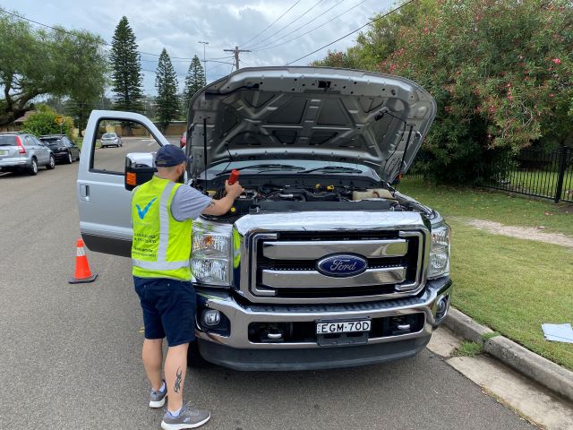 last-check-inspector-inspecting-an-imported-ford-f150